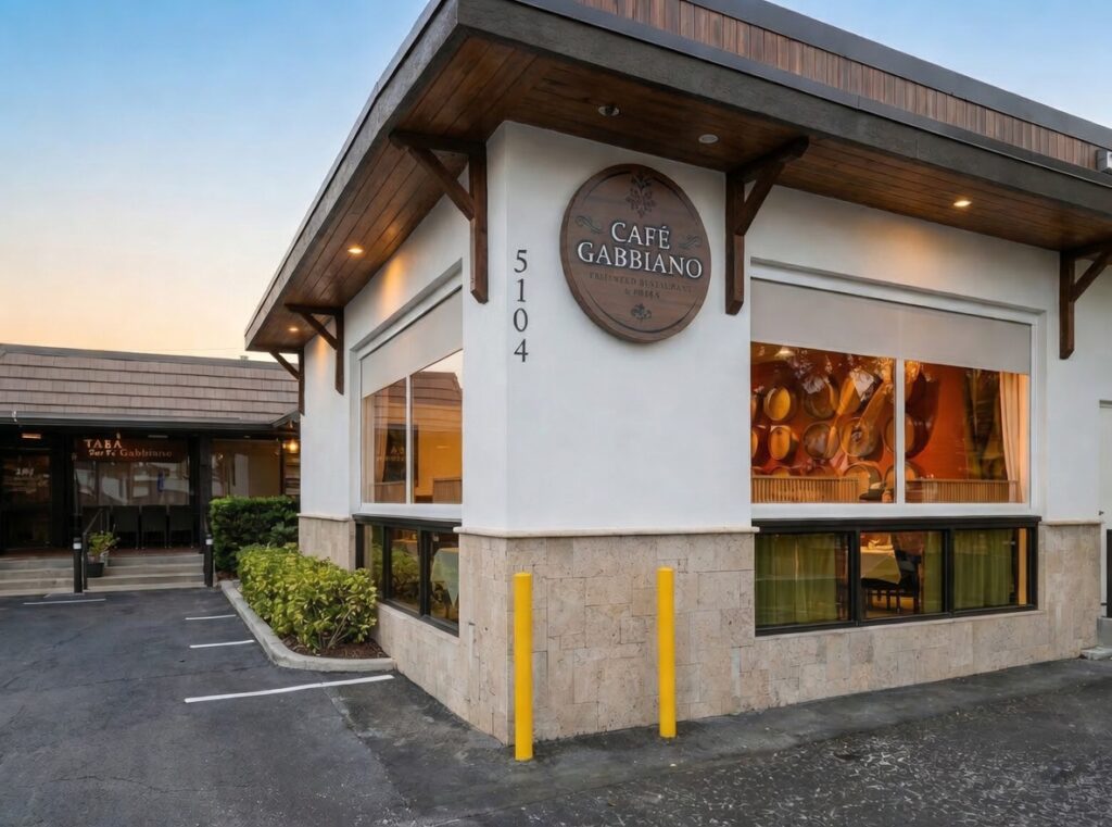 Projects 5 Café Gabbiano exterior renovation with wood accents and large windows built by Holliday Group in Siesta Key